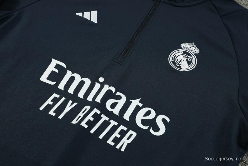 23/24 جاكيت بقلنسوة نصف سحاب + بنطلون بقبعة كحلية اللون الكحلي لريال مدريد 23/24
