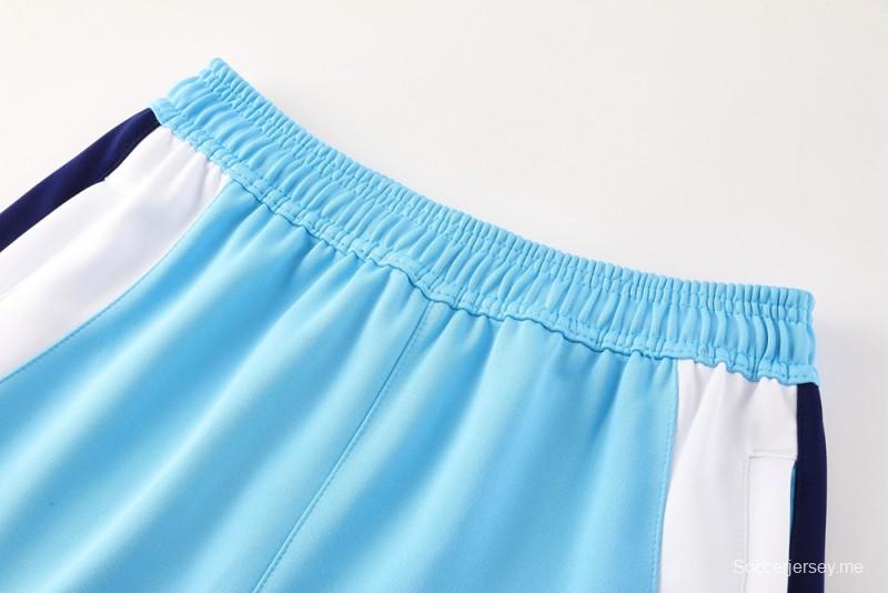 طقم بدلة رياضية نايك إير 2025 - أزرق فاتح مع لمسات كحلية اللون أزرق فاتح مع جاكيت بسحاب كامل + بنطال طويل