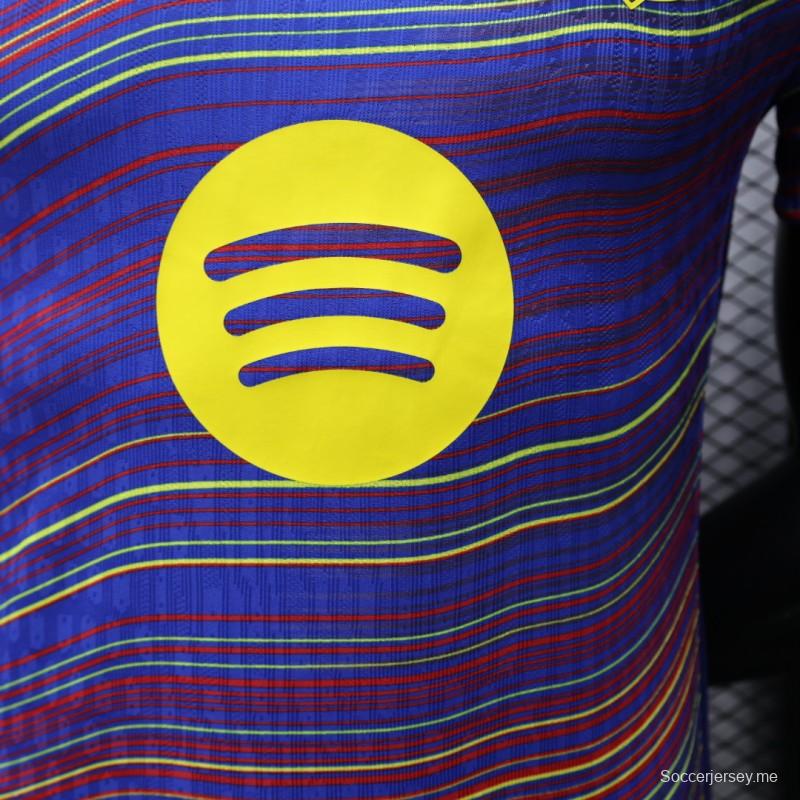إصدار اللاعب 25/26 قميص نادي برشلونة أزرق بخطوط موجية ملونة