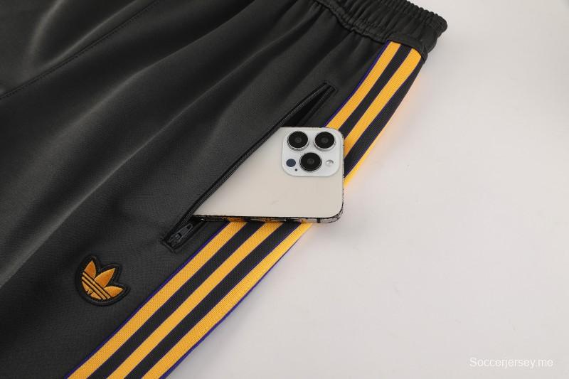 25/26 مانشستر يونايتد 08 رمادي غامق بنصف سحاب 25/26 مانشستر يونايتد + بنطال طويل S-2XL