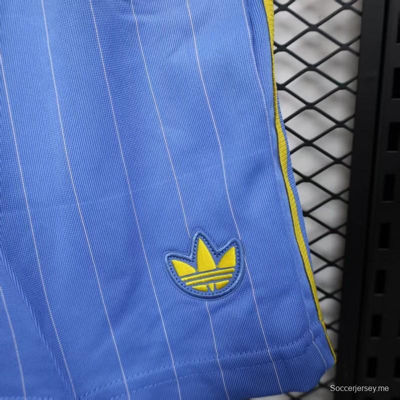 نسخة اللاعب القديمة 1990/91 مانشستر يونايتد الثالثة باللون الأزرق السماوي مع شورت بنقشة الخطوط الدبابيس