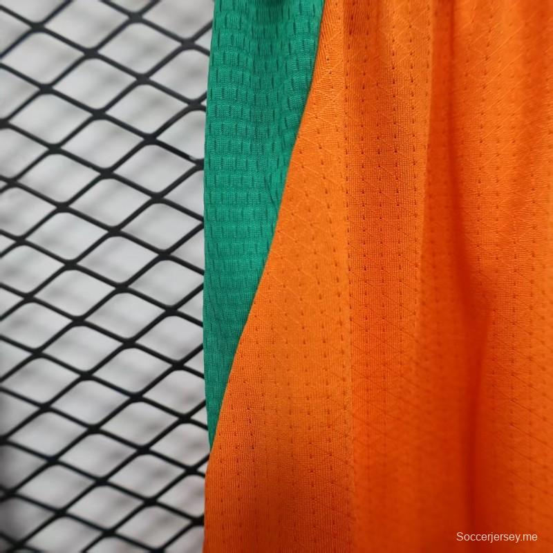 2026 نسخة اللاعب كوت ديفوار برتقالي مع شورت أخضر مع أجزاء جانبية خضراء
