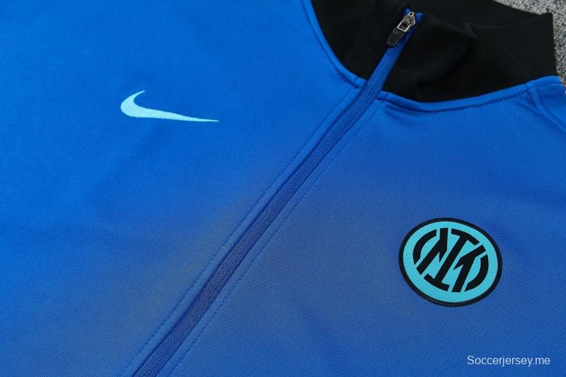 26/27 طقم رياضي من إنتر ميلان: سترة زرقاء بسحاب كامل + بنطال طويل أسود