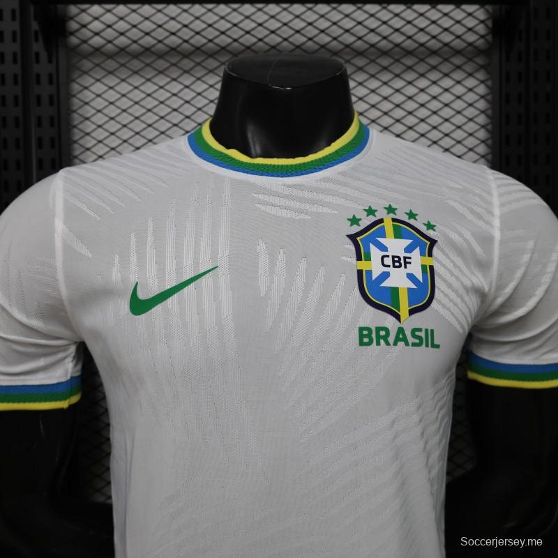 قميص اللاعب الإصدار 2026 باللون الأبيض بنمط أوراق النخيل، إصدار خاص