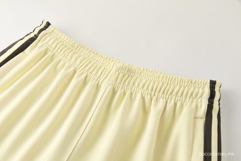 2026  سترة بأزرار كاملة + بنطال طويل من Adidas بلون المشمش