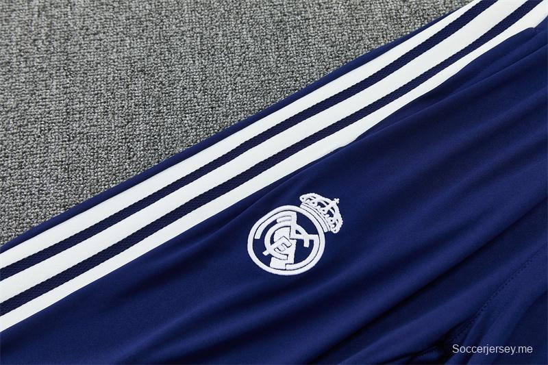 طقم رياضي للأطفال مقاس 26/27 من ريال مدريد باللون الأبيض مع سترة ذات سحاب نصف طول وبنطال طويل