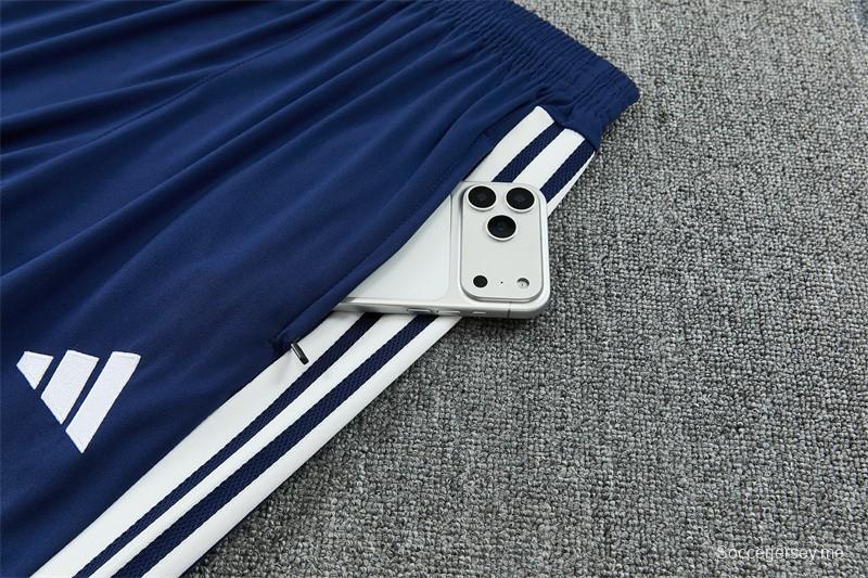 26/27 ريال مدريد - بدلة رياضية باللون الأزرق الداكن بسحاب نصف طول + بنطال طويل