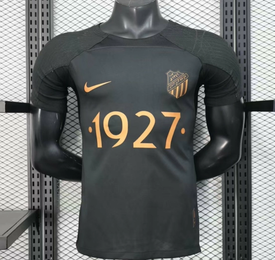 نسخة اللاعب 25/26 قميص بطل الأهلي الأسود مع الراعي الذهبي