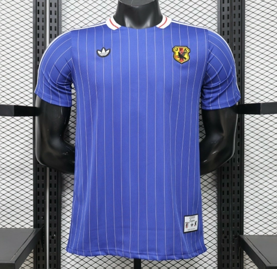 قميص اللاعب الإصدار 2026 باللون الأزرق الياباني مع أيقونات "تراس" باللون الأبيض